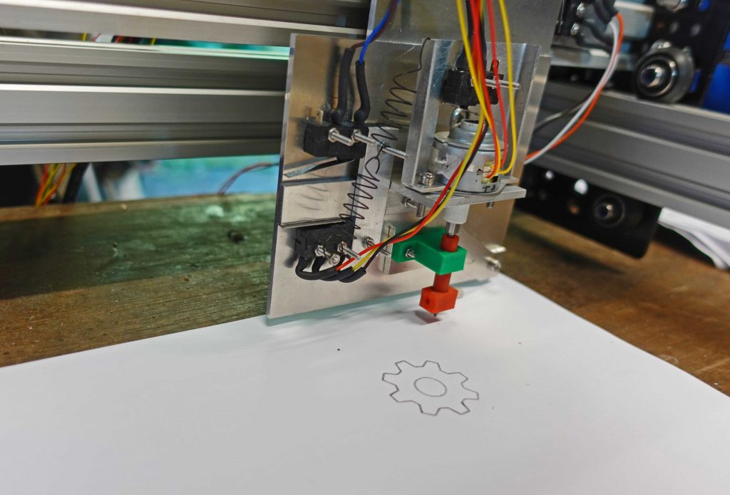 laser cutter drawing head showing springs