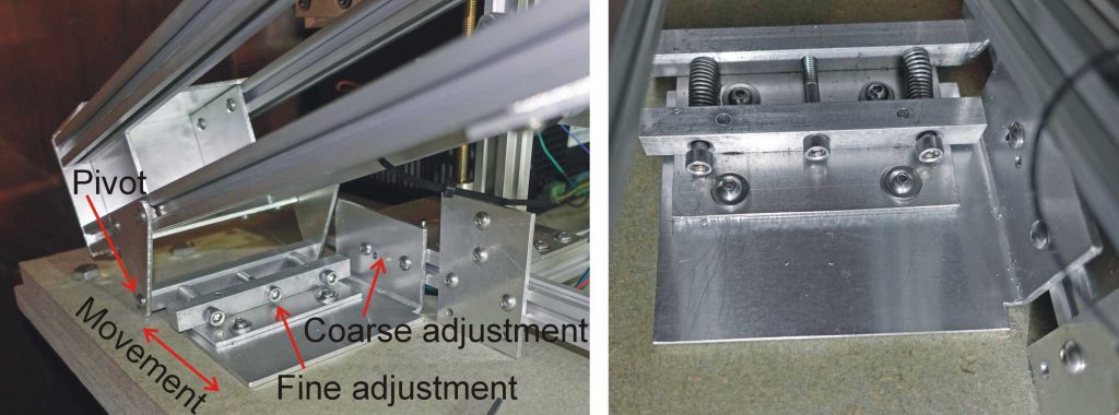 Laser cutter laser cradle rear pivot adjustment