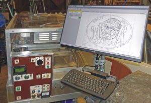 Laser cutter showing Raspberry Pi running bCNC.