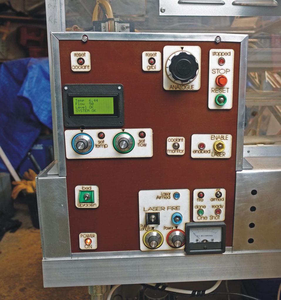 Laser cutter control panel with labels.